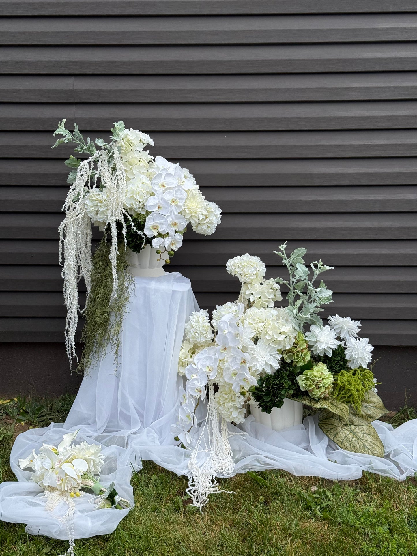White hydrangeas, dahlias, hanging amaranthus and orchid modern wedding 