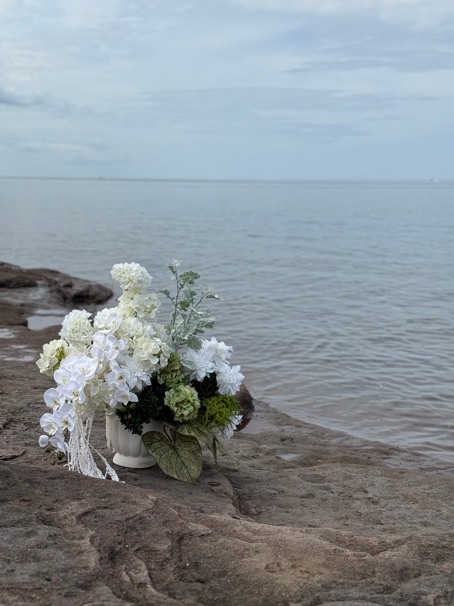 White hydrangeas, dahlias, hanging amaranthus and orchid modern wedding 