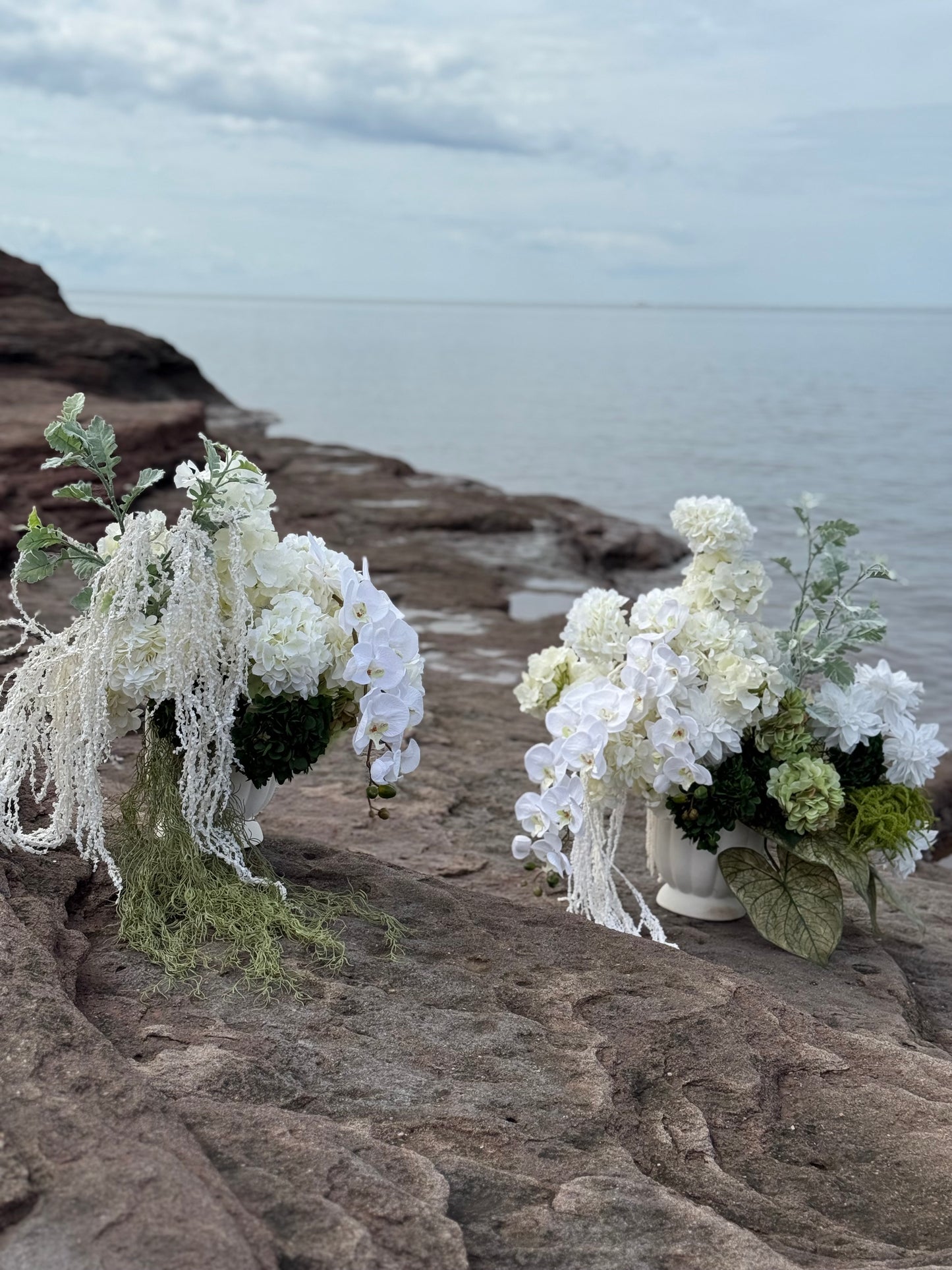 White hydrangeas, dahlias, hanging amaranthus and orchid modern wedding 