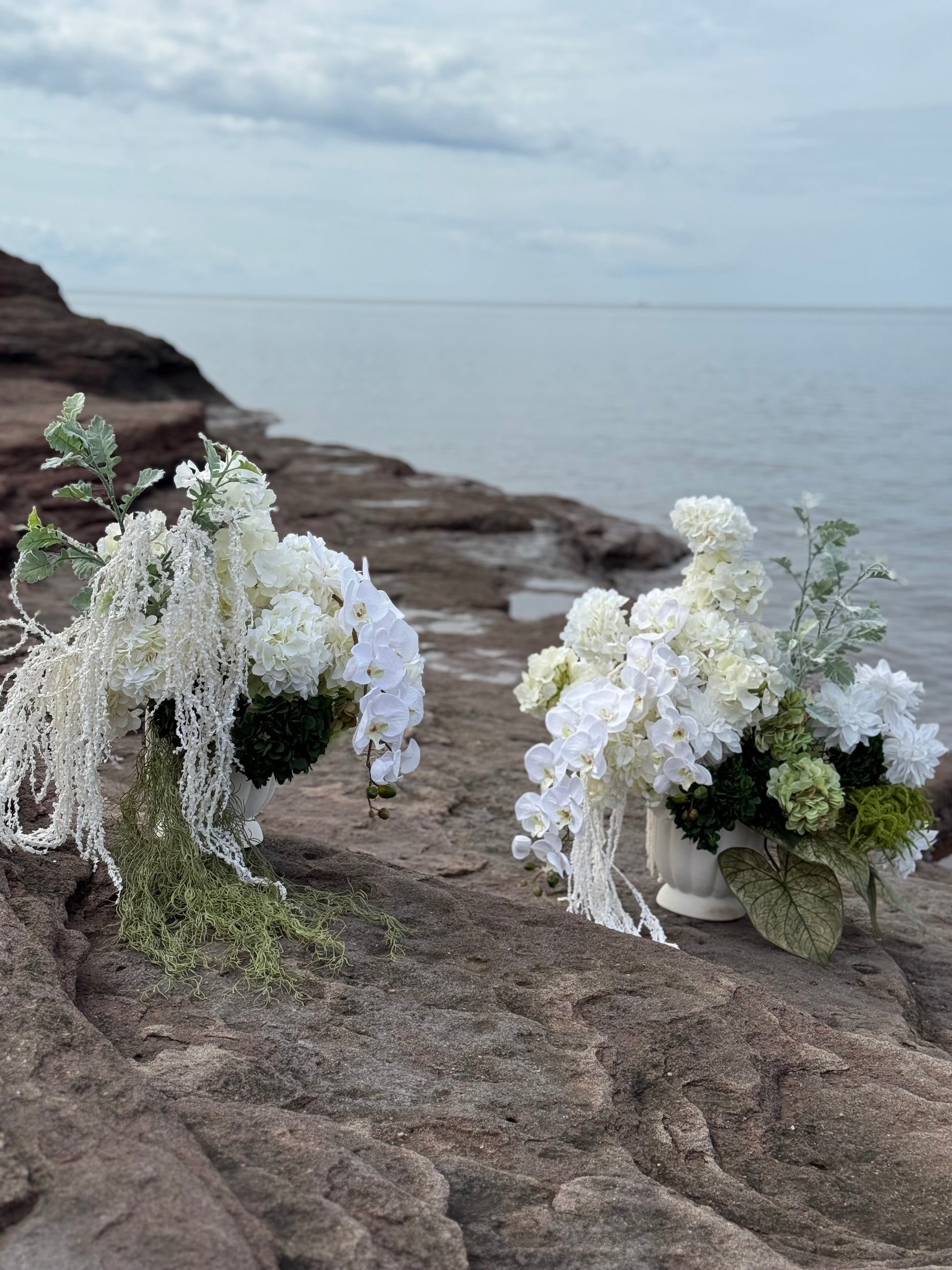 White hydrangeas, dahlias, hanging amaranthus and orchid modern wedding 