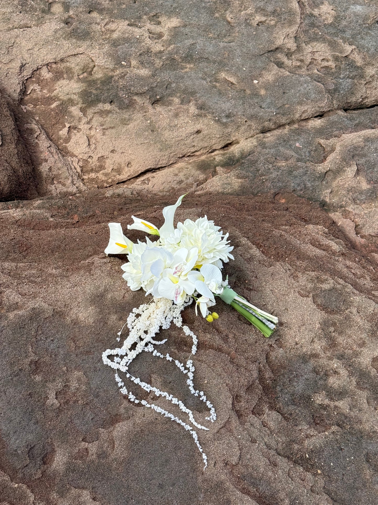White hydrangeas, dahlias, hanging amaranthus and orchid modern wedding 