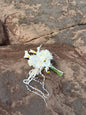 White hydrangeas, dahlias, hanging amaranthus and orchid modern wedding 