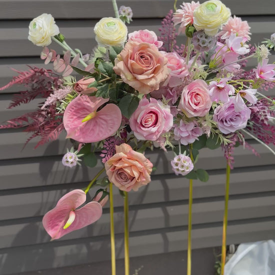 Floral decor with anthurium, brown roses, eucalyptus and garden roses