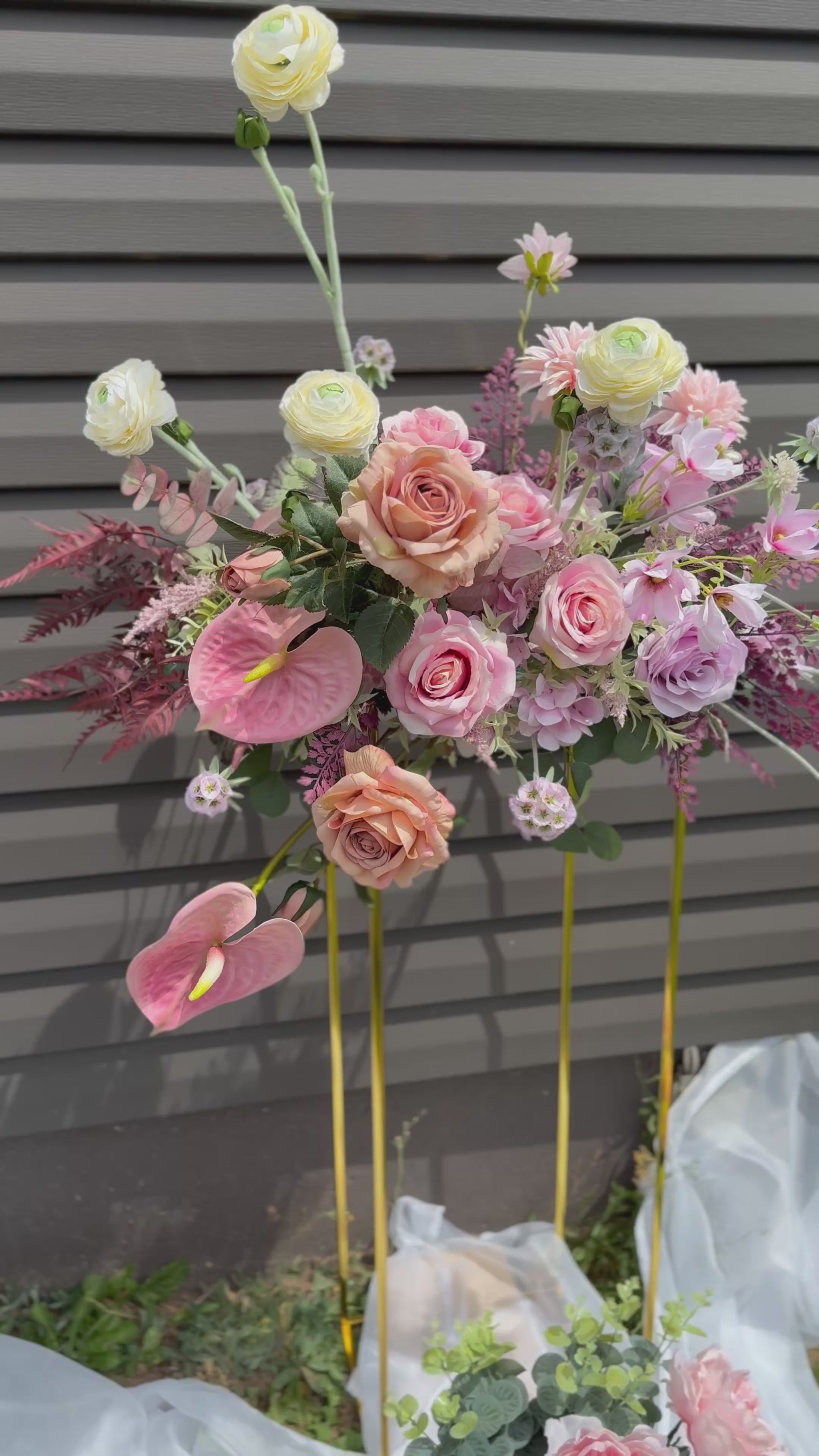 Floral decor with anthurium, brown roses, eucalyptus and garden roses