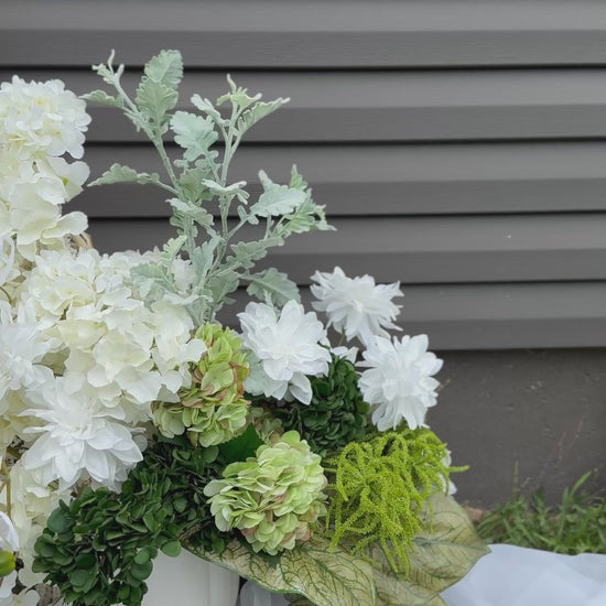 White hydrangeas, dahlias, hanging amaranthus and orchid modern wedding floral decor 
