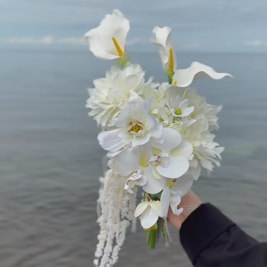 White hydrangeas, dahlias, hanging amaranthus and orchid modern wedding 