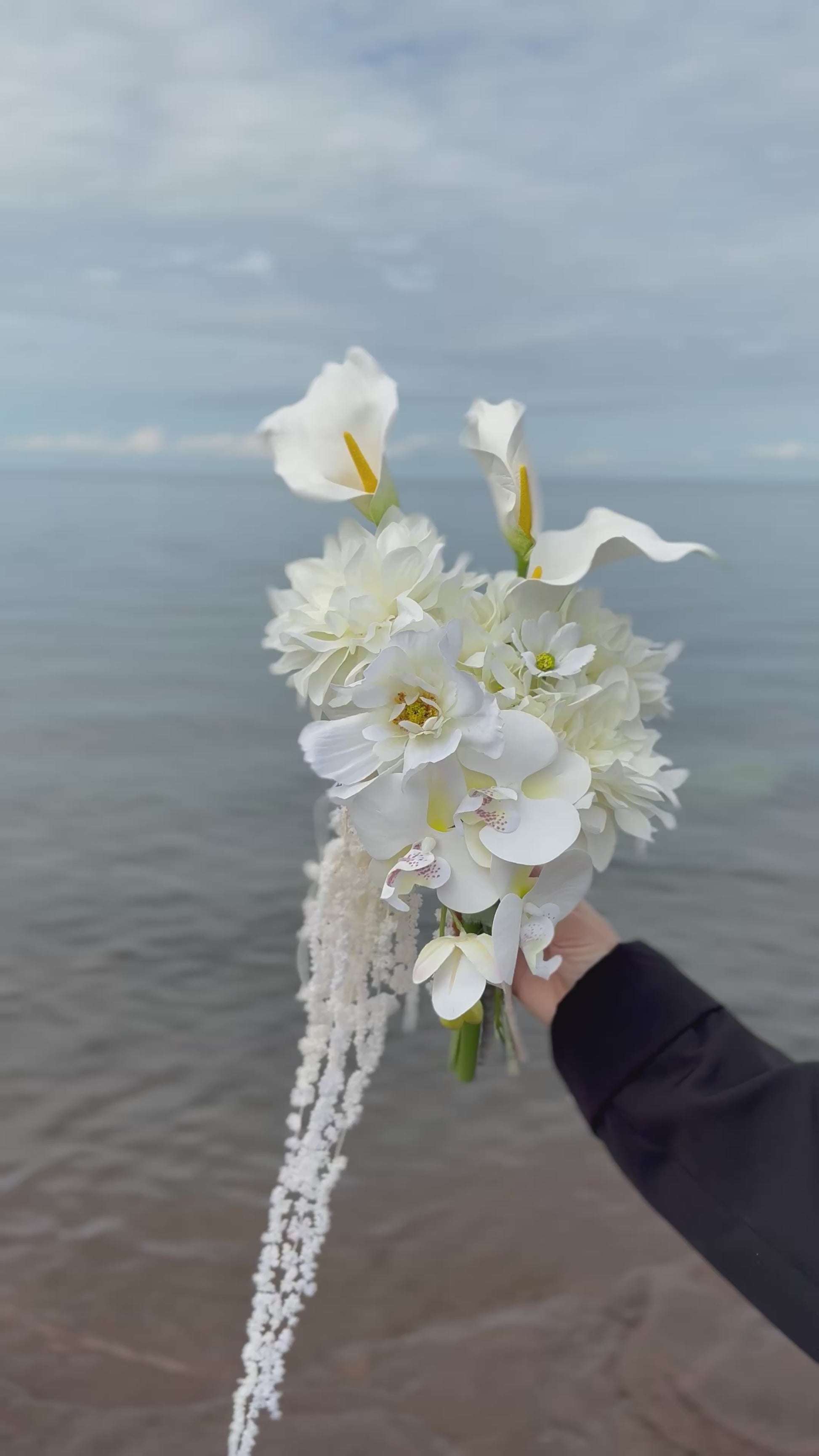 White hydrangeas, dahlias, hanging amaranthus and orchid modern wedding 