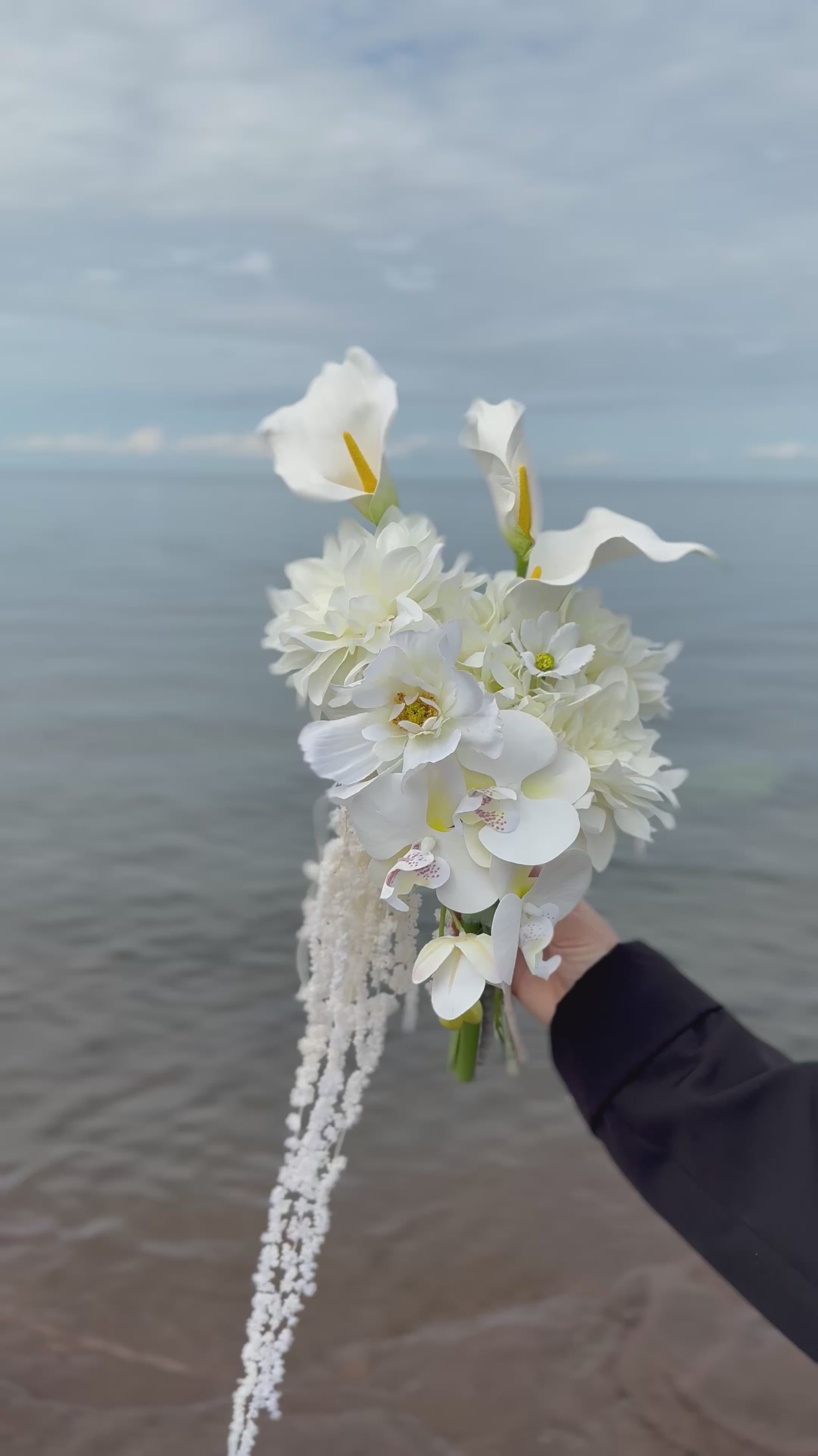 White hydrangeas, dahlias, hanging amaranthus and orchid modern wedding 